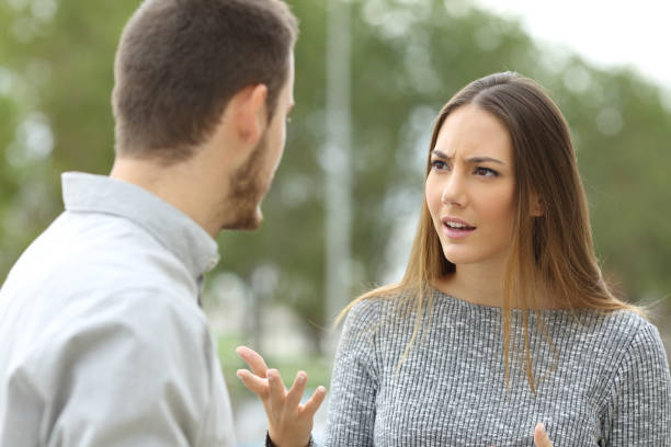 istock Couple talking seriously outdoors 638891030