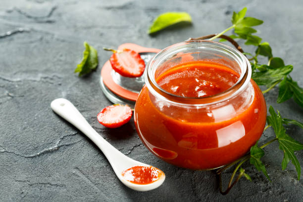 ketchup  - vinegar bottle herb white stock-fotos und bilder