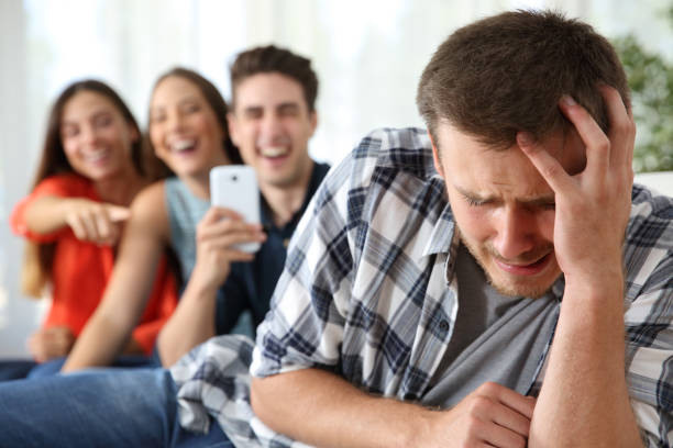 istock Friends bullying to a sad boy 638891564