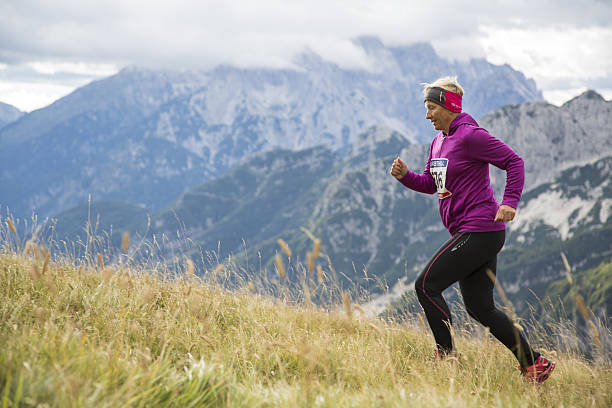Woman running on mountain