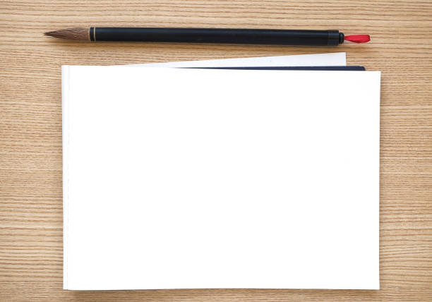 istock Chinese writing brush with white paper 638897884