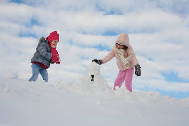 istock Two cute grill in the snow. 638898032