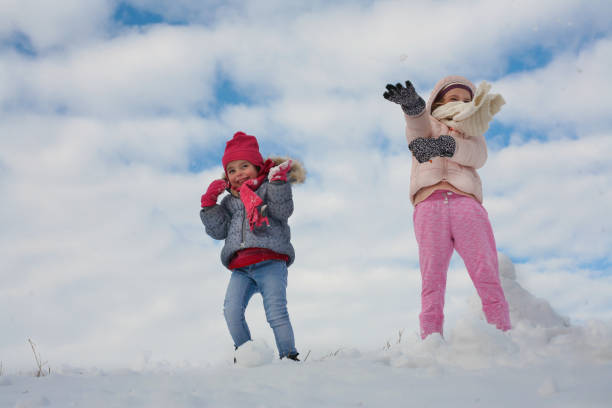 istock Two cute grill in the snow. 638898126