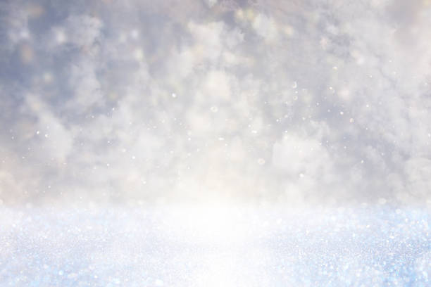 istock glitter lights background. silver, light blue and white 638898602
