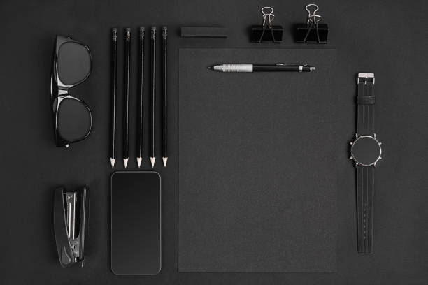 istock Blank notepad with clips, pens and glasses flat lay. 638901792