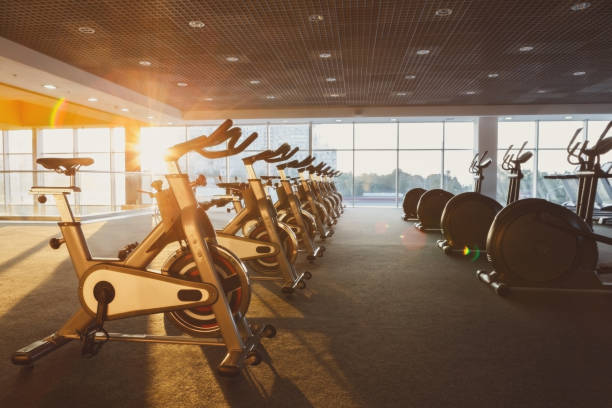 istock Modern gym interior with equipment, fitness exercise bikes 638902962