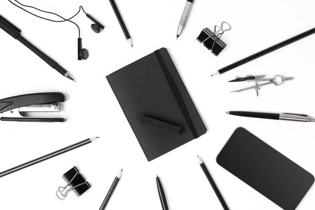 istock Blank notepad with clips, pens and glasses flat lay. 638903186