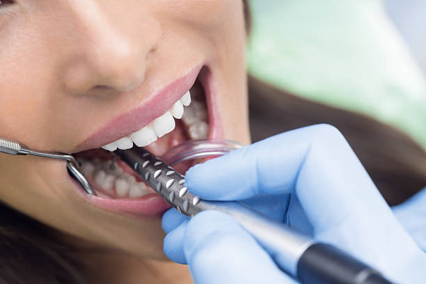 istock Young Woman At The Dentist 638903594