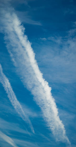 istock Blue sky with air steam traces 638903716