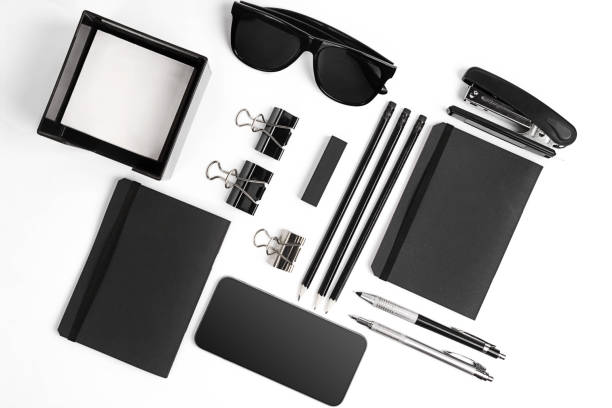 istock Blank notepad with clips, pens and glasses flat lay. 638903768