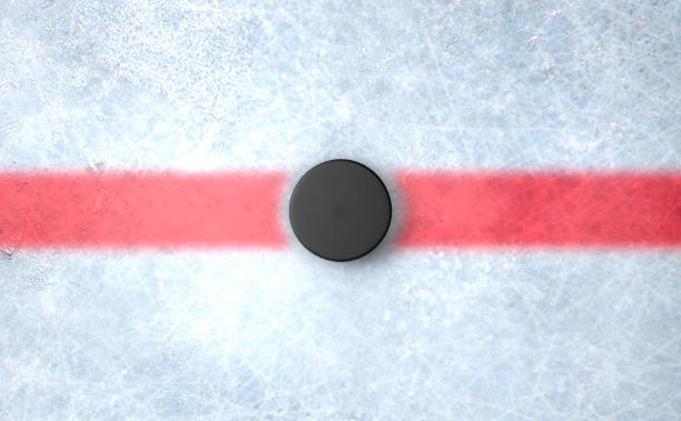 Hockey Puck Centre A 3D render of the center mark of an ice hockey rink stadium with a hockey puck hockey puck stock pictures, royalty-free photos & images