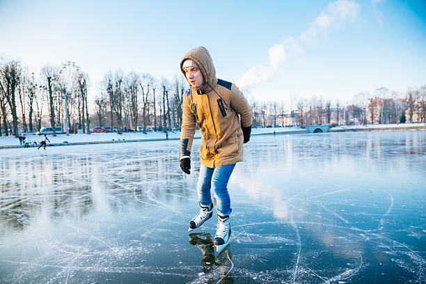 istock Ice skating on the frozen lake 638910188