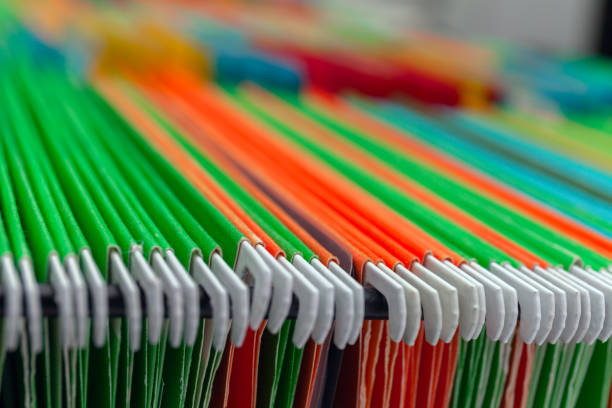 istock Abstract background colorful hanging file folders in drawer. 638910500