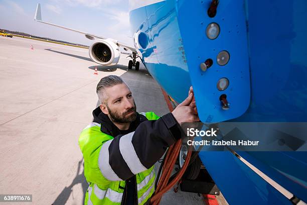 Airport Worker Stock Photo - Download Image Now - Ground Crew, Uniform, Adult