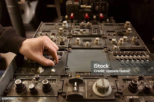 Aircraft Engineer Examining Cockpit Stock Photo - Download Image Now - Adult, Air Vehicle, Airplane