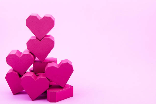 istock Stack of paper box red heart shape 638911980
