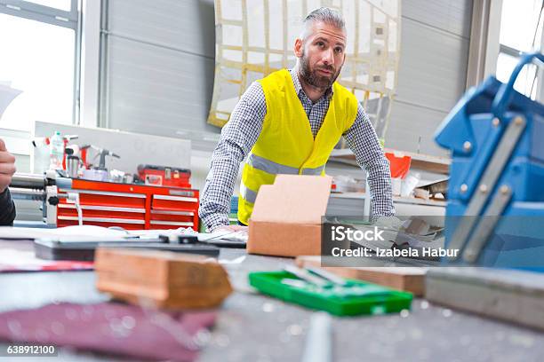 Construction Engineer At Work Stock Photo - Download Image Now - Adult, Beard, Business