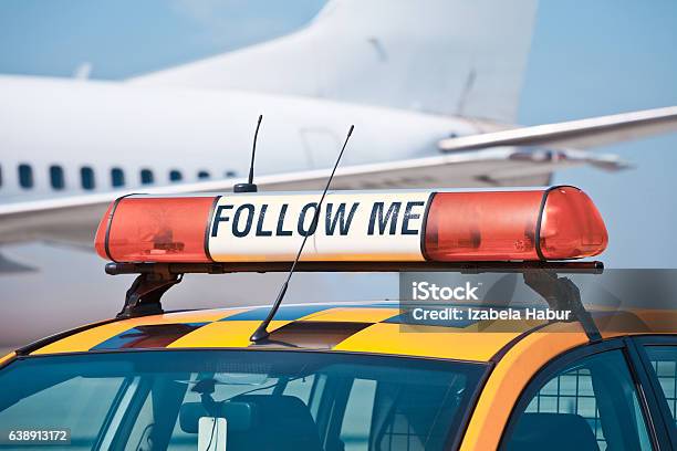 Follow Me Car At The Airport Stock Photo - Download Image Now - Airport, Airport Runway, Car
