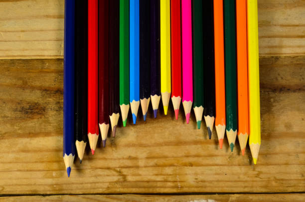 istock Colour pencils on a wooden table 638913226