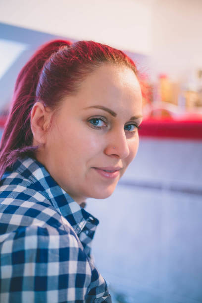 istock happy woman cooking on kitchen 638913340