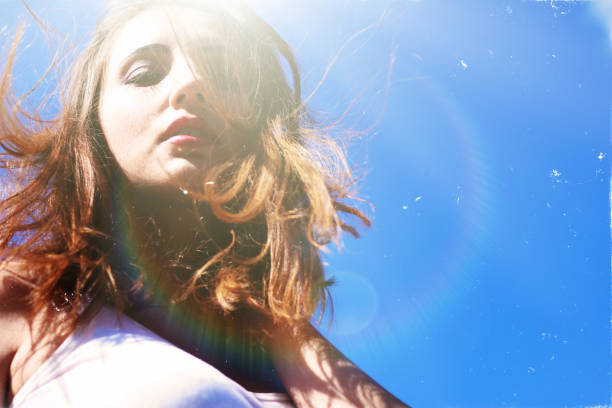 istock Seductive young woman on a windy day 638914562