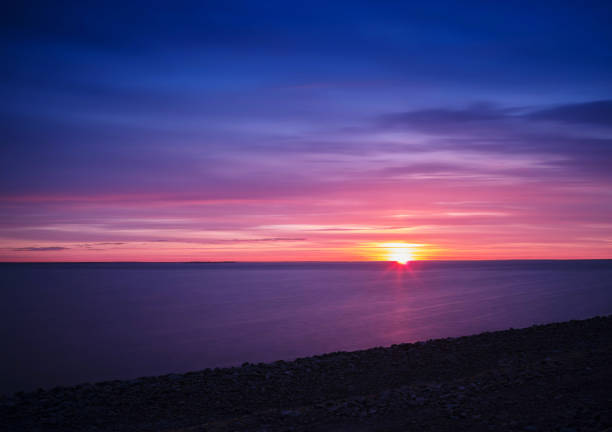 istock Horizontal vivid vibrant Baltic sunset horizon background backdr 638915500