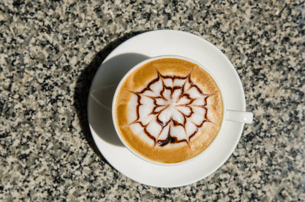 istock Barista making a cup of coffee soft focus image . 638918850