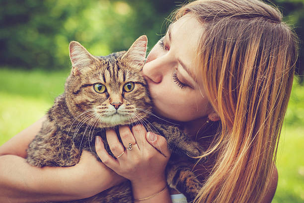 istock Young woman and her cat 638918960