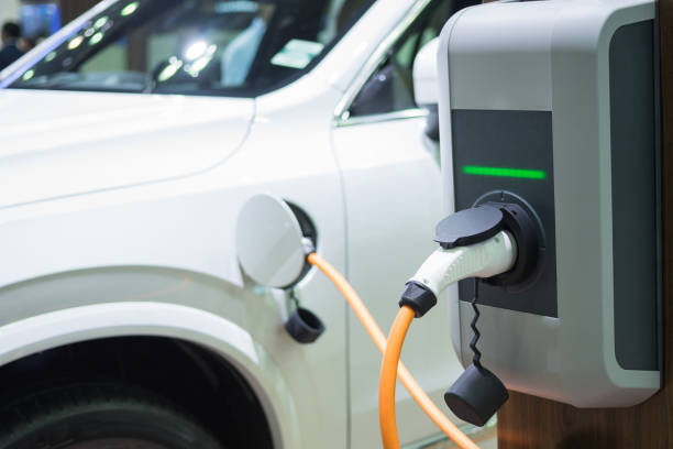 istock Charging an electric car with the power cable supply 638921204