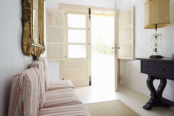 istock Room In Modern Home With Open French Windows 638924242