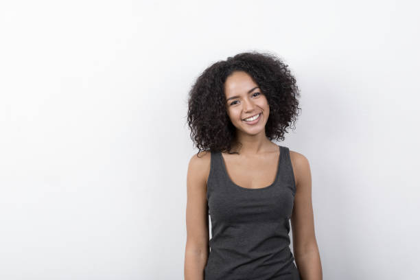 istock Young cheerful brunette with toothy smile 638924446