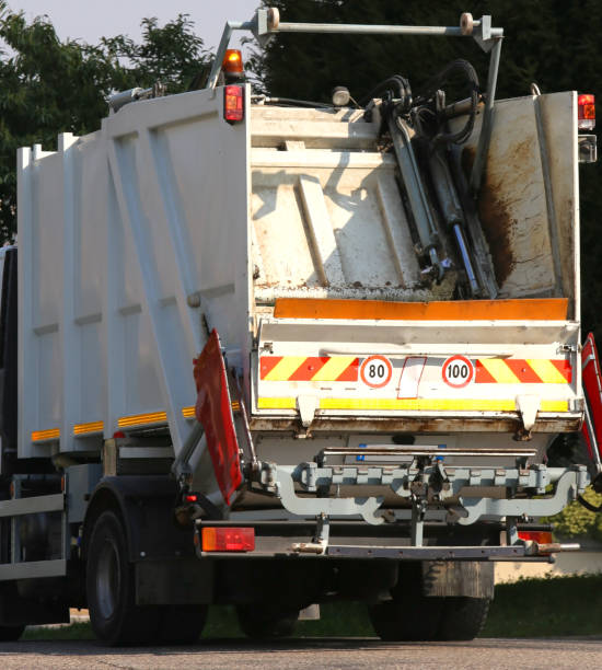 istock Waste collection vehicle operating in the streets 638925352