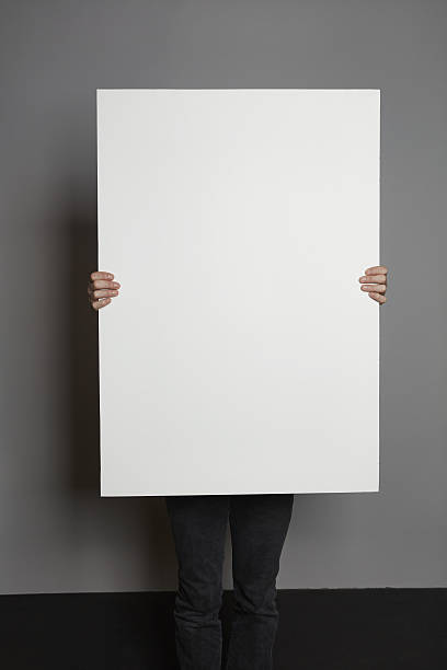 istock Man holding a big sign - Sing holder 638925916