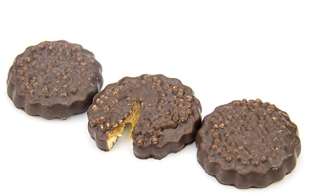 istock Chocolate cookies with cream filling isolated on white background. 638926262