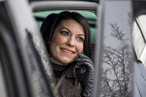 istock Beautiful woman talking on the phone 638926892