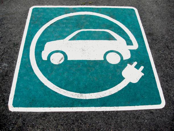 istock Eco electric car sign on asphalt 638933228