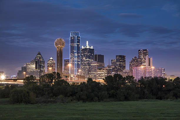 Dallas Texas Skyline and Reunion Tower Dallas downtown cityscape at night in Texas USA reunion tower photos stock pictures, royalty-free photos & images