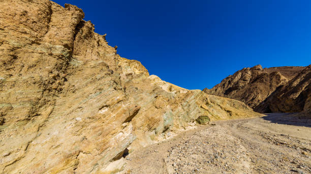 istock The gorge cuts into brightly colored sandstone rocks. 638935486