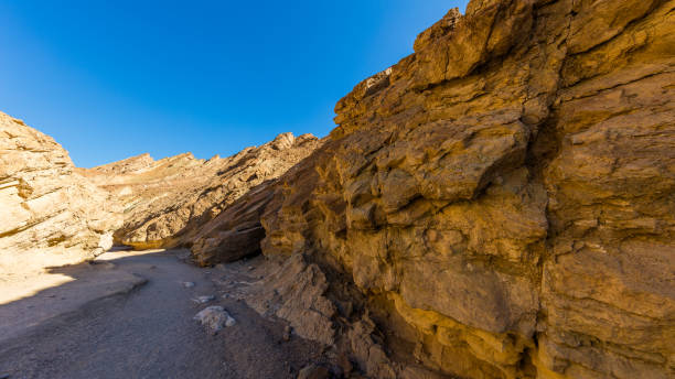 istock The gorge cuts into brightly colored sandstone rocks. 638935704