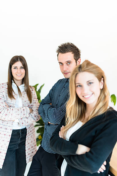 istock friends standing in the office 638935898