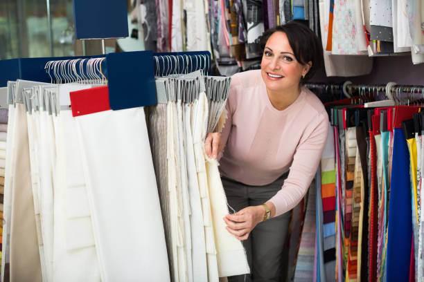 istock Brunette woman in textile shop 638939270