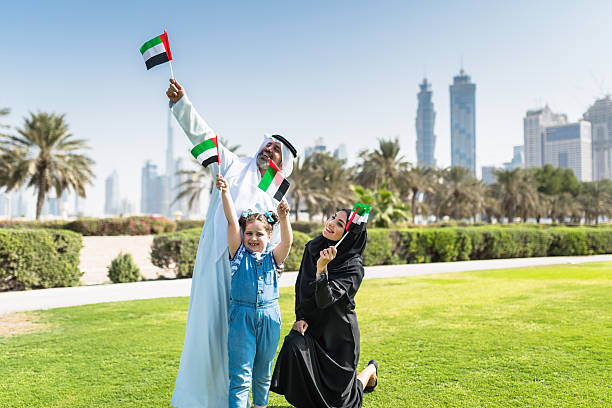 happy family in dubai for the national day happy national day national day of uae stock pictures, royalty-free photos & images