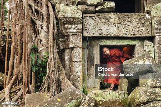 Monk Exploring Old Ruins Stock Photo - Download Image Now - Angkor Wat, Cambodia, Monk - Religious Occupation