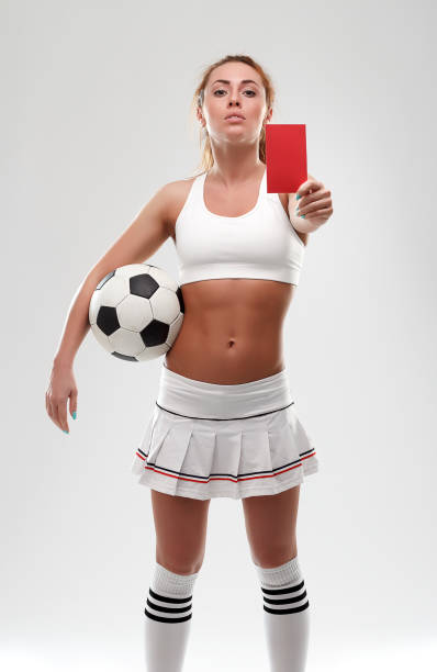 istock Football supporter with red card on white background 638943476