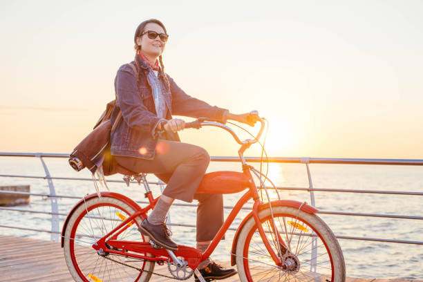 istock woman riding on seaside 638946914