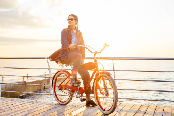 istock woman riding on seaside 638948298