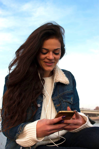 istock Girl by the river 638949072