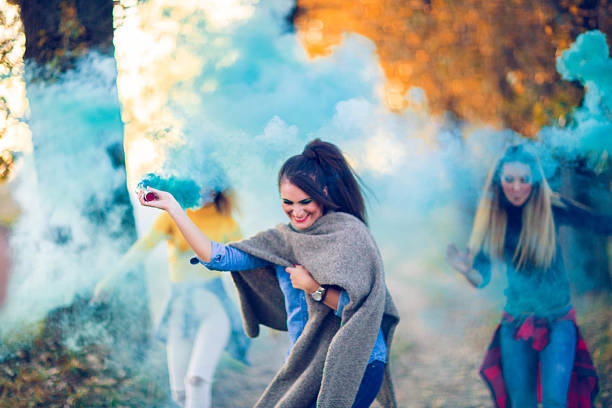 istock Rebel girls with smoke bombs 638949528