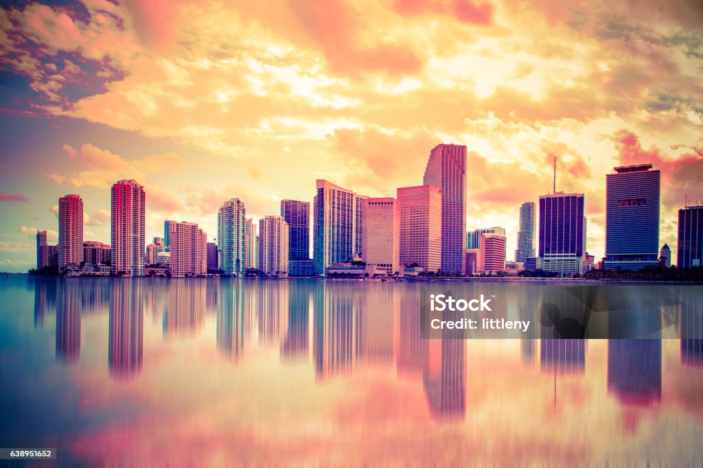 Colorful Sunset Miami Skyline Beautiful colorful city of Miami Florida skyline and bay with dramatic clouds at sunset Miami Stock Photo