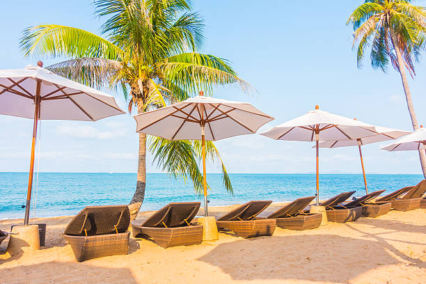 istock Parasol and chair on the beach 638951872